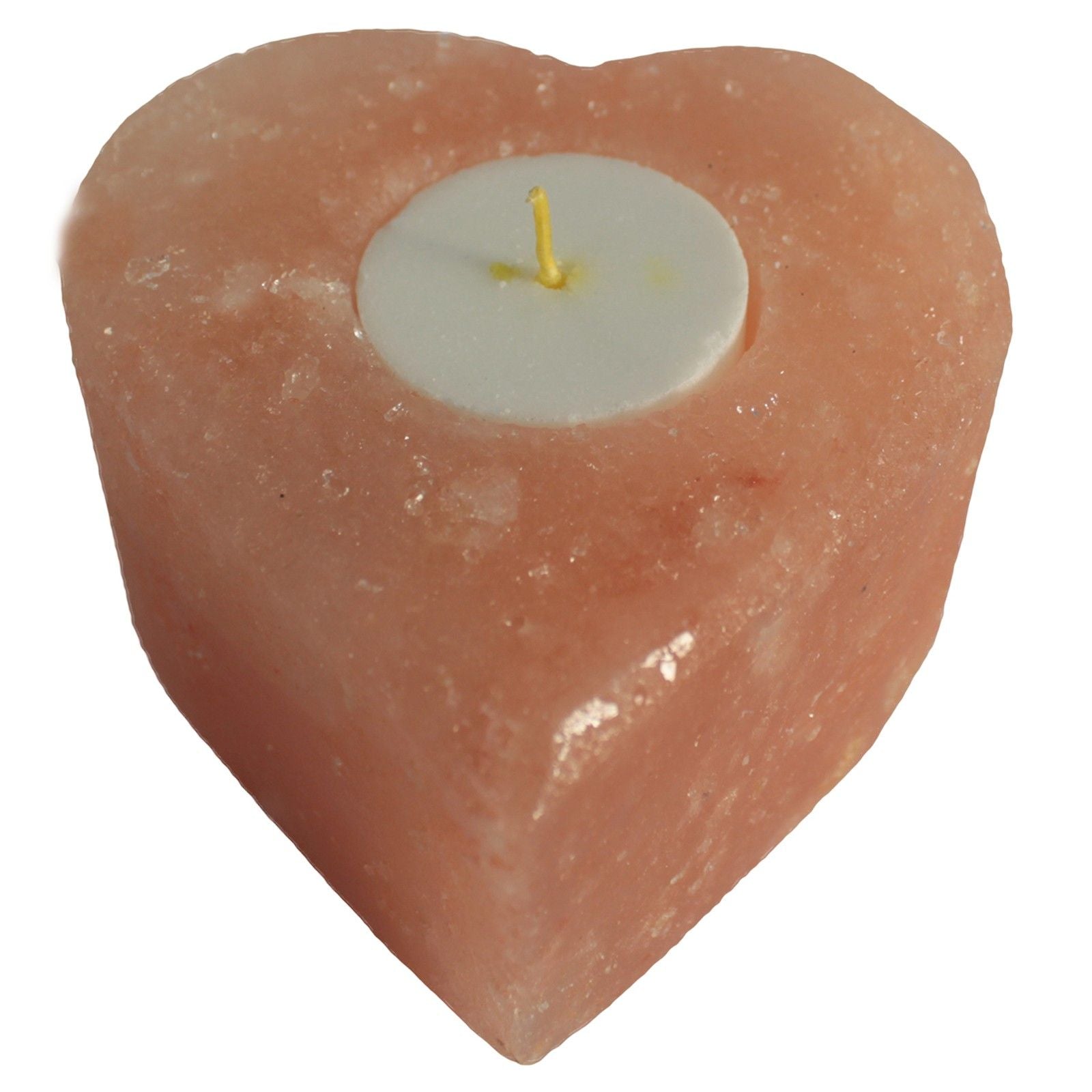 Medium heart-shaped pink Himalayan salt candle holder with a natural textured surface and central tea light carved out.