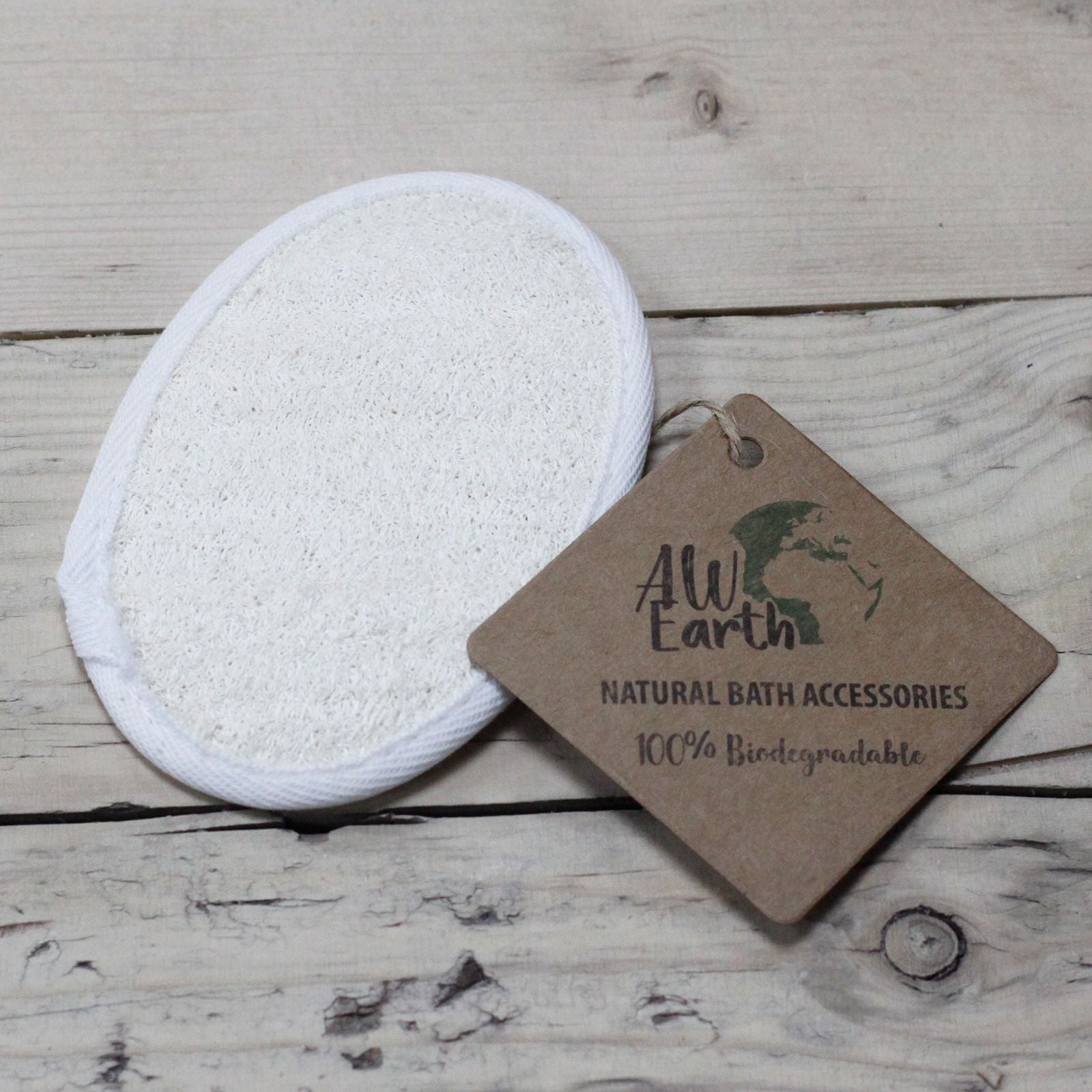 A natural, textured oval-shaped loofah sponge for gentle skin exfoliation and cleansing.