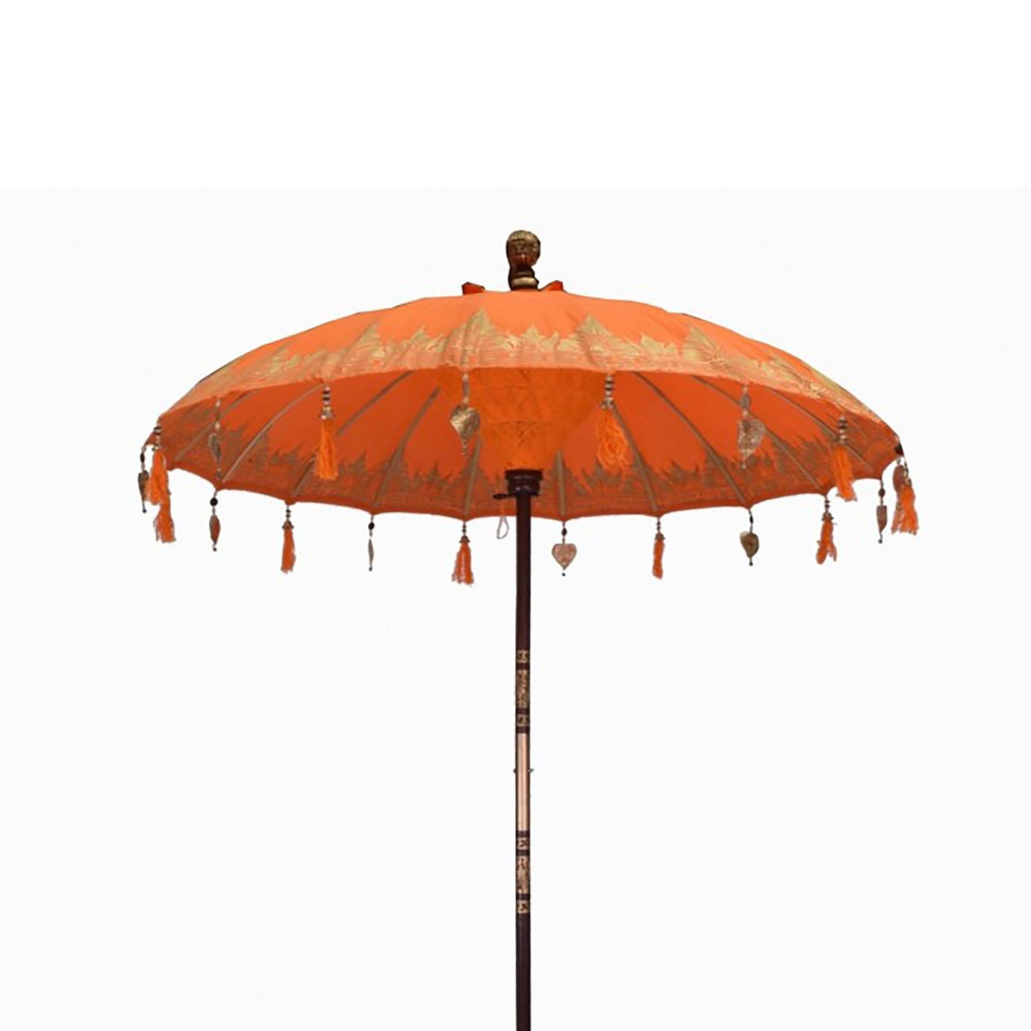 Handcrafted 2m orange cotton Bali patio parasol with intricate decorative details in a sunny outdoor setting.
