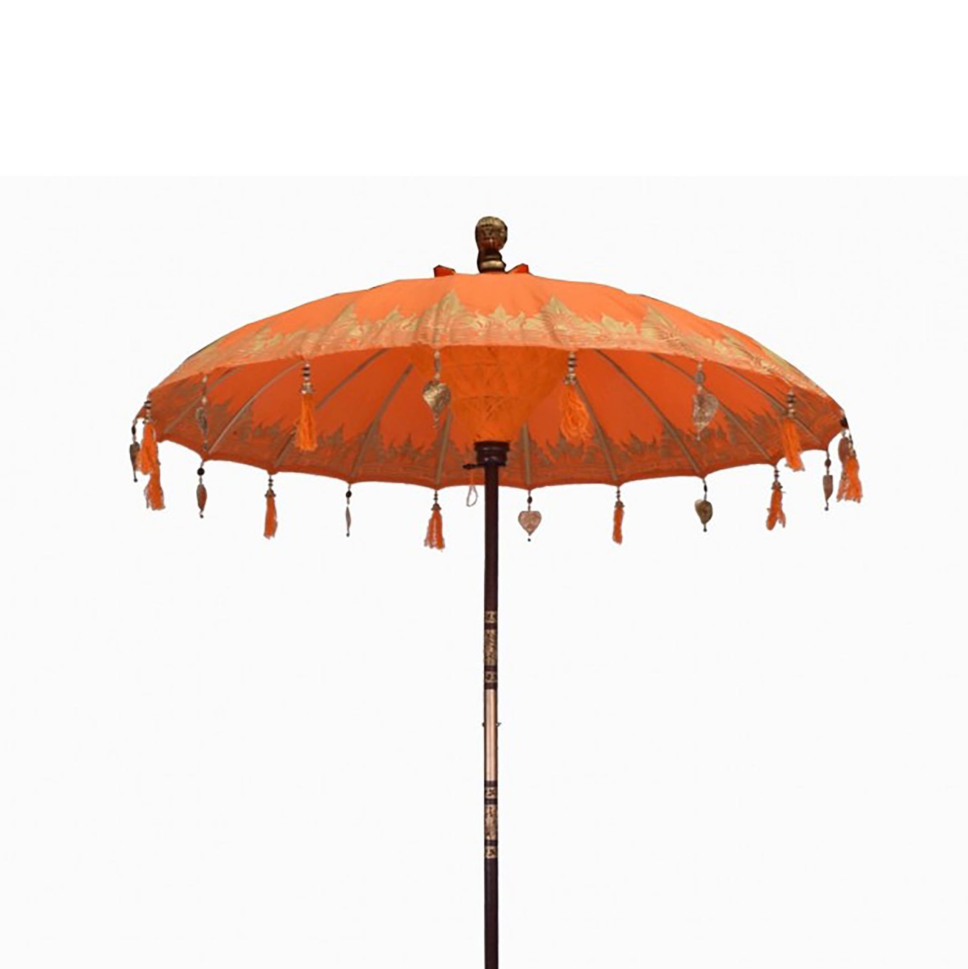 Handcrafted 2m orange cotton Bali patio parasol with intricate decorative details in a sunny outdoor setting.