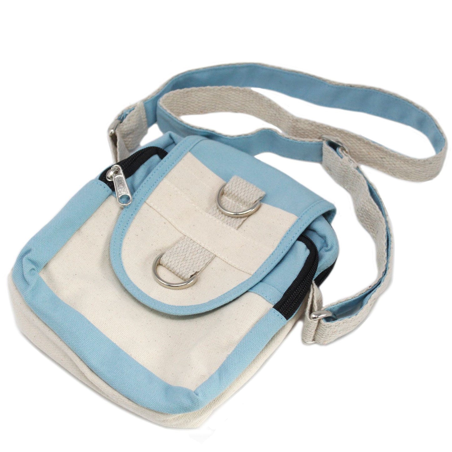 Handmade teal natural cotton cross body travel bag featuring two secure zipped pockets and a comfortable shoulder strap.