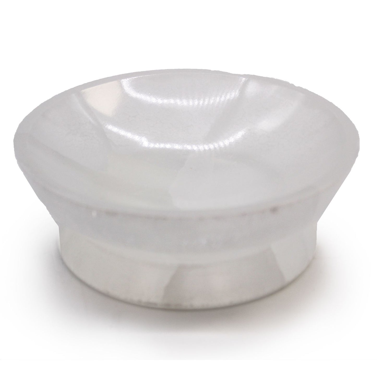 Handcrafted translucent white selenite bowl with a smooth finish and natural mineral glow on a plain background.