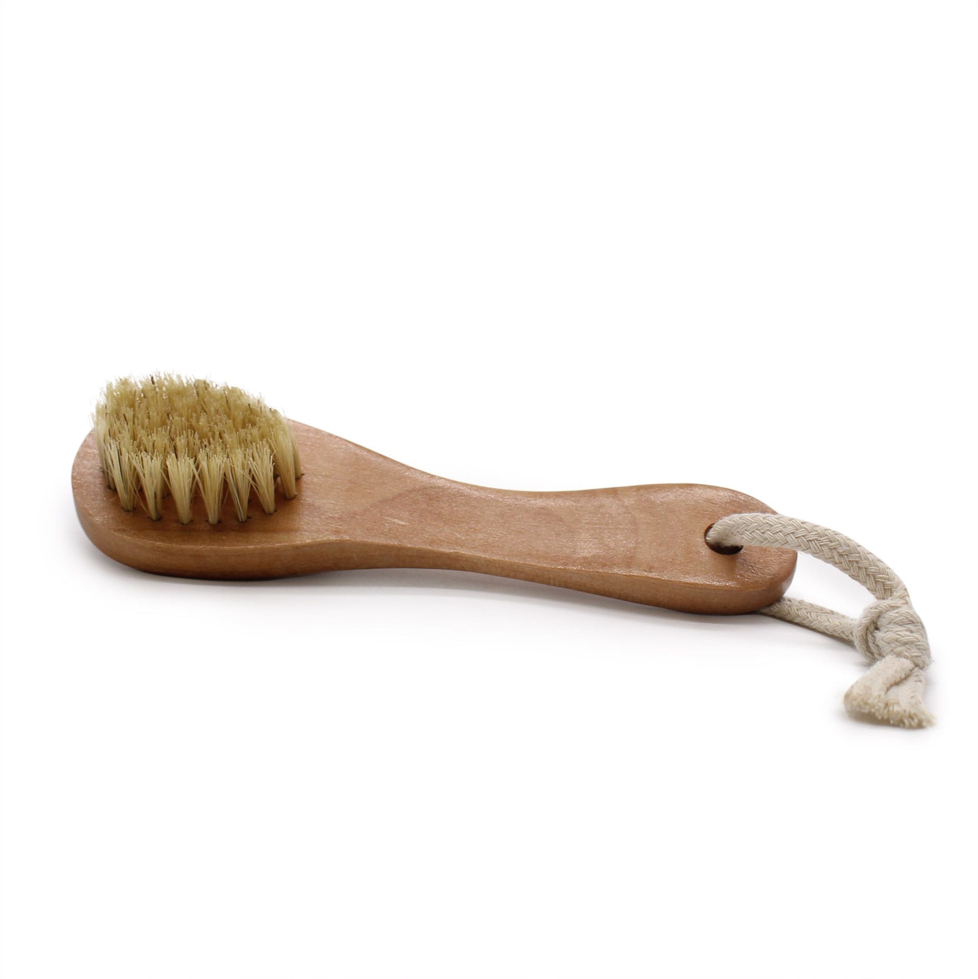 A high-quality facial exfoliating brush with soft bristles designed for a deep, radiant skin cleanse.
