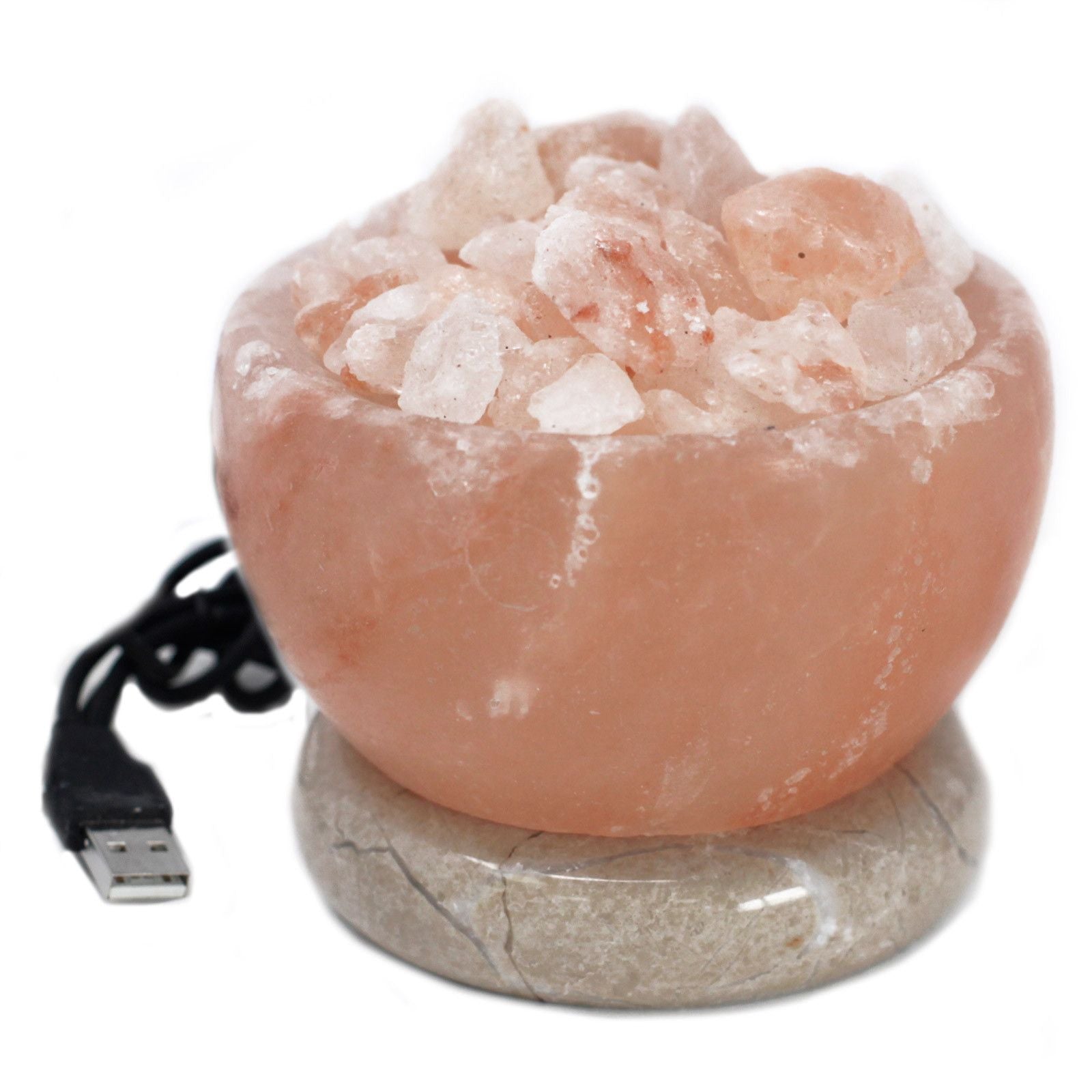 A glowing crystal salt lamp bowl filled with raw salt chunks, emitting a vibrant multi-coloured light from within.