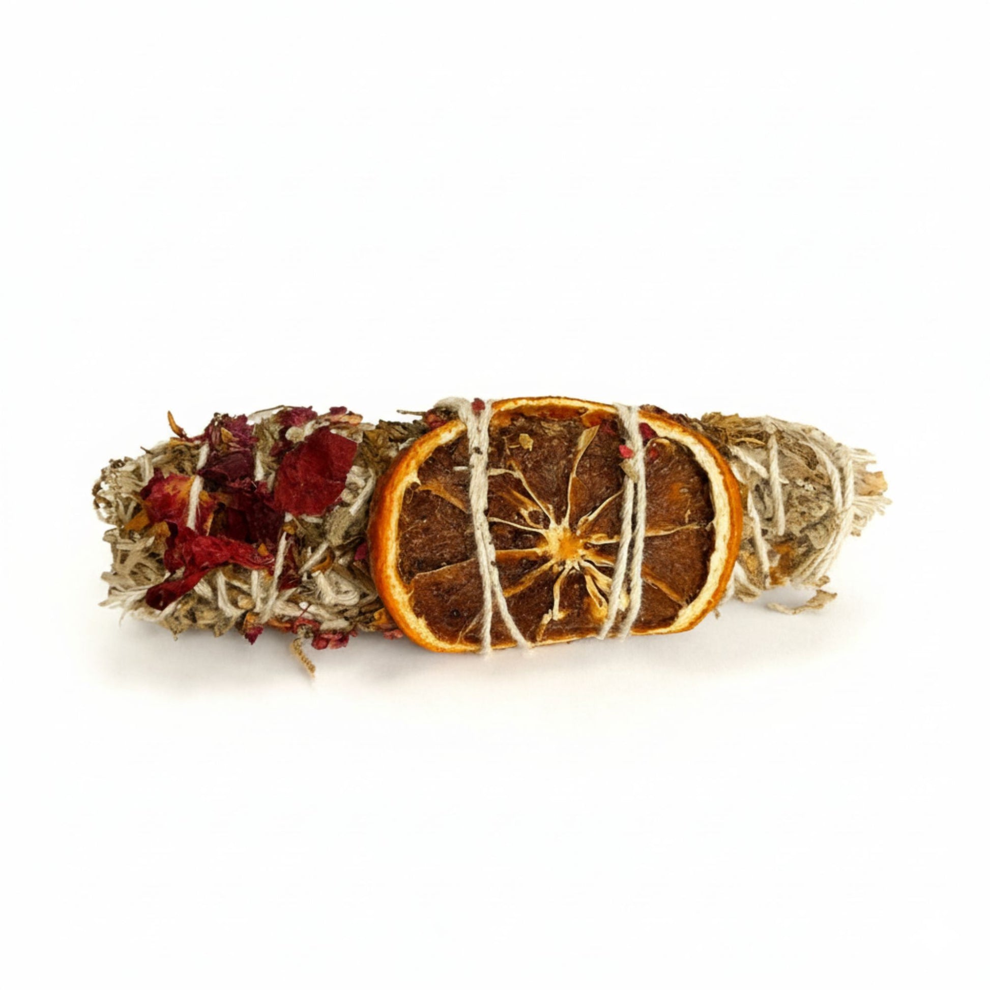 Handcrafted smudge stick bundle made of dried Indian sage and patchouli leaves tied with natural string.