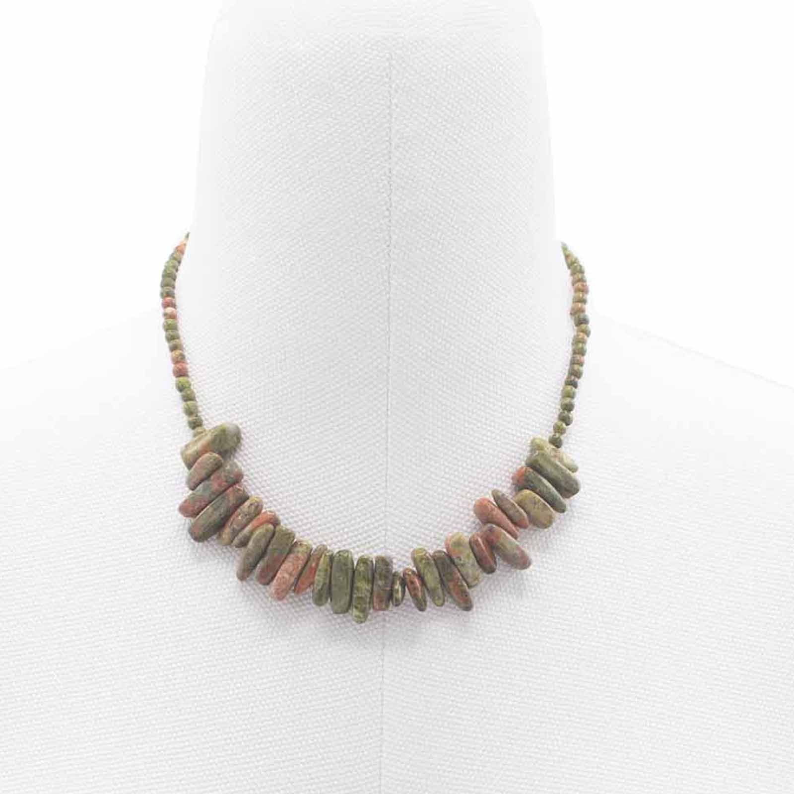 Longstone pendant necklace featuring mottled green and pink unakite gemstone beads on a delicate chain.