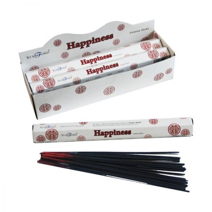 Hexagonal box of premium incense sticks with a vibrant design and natural incense sticks displayed.