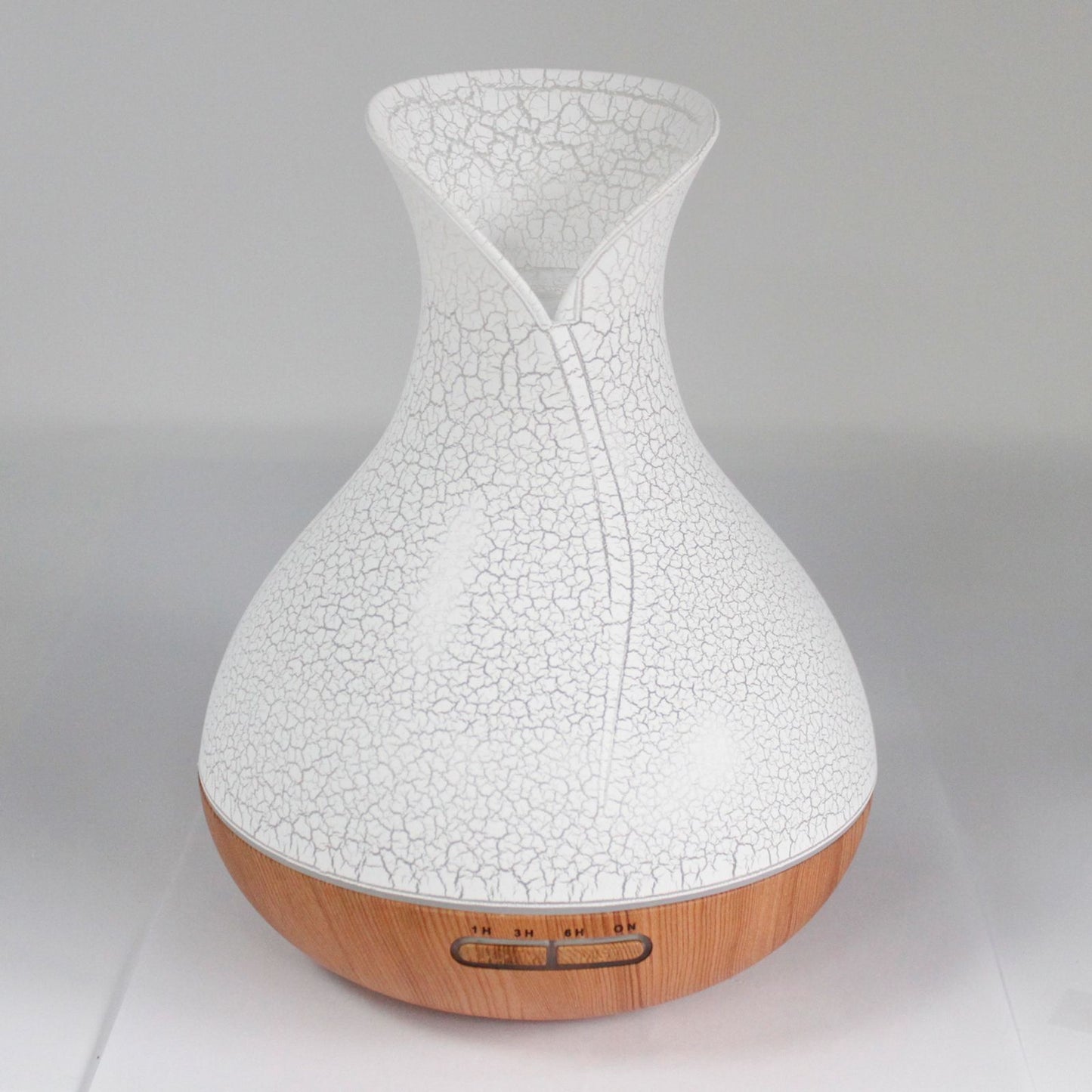 Large white ultrasonic aroma atomiser featuring a decorative shell effect texture and a glowing LED light band.