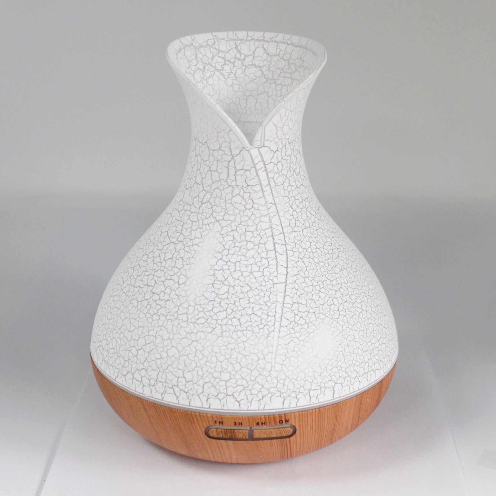 Large white ultrasonic aroma atomiser featuring a decorative shell effect texture and a glowing LED light band.