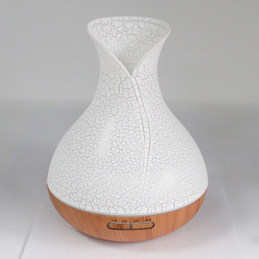Large white ultrasonic aroma atomiser featuring a decorative shell effect texture and a glowing LED light band.
