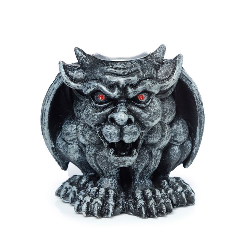 Detailed grey gothic gargoyle seated on a stone-like pedestal with a backflow incense cone releasing a waterfall of smoke.