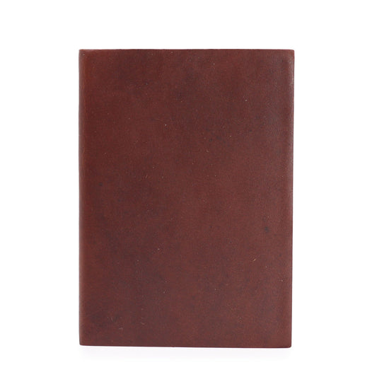 Vintage medium dark tan leather notebook with 100 lined pages and a rustic wrap-around closure.