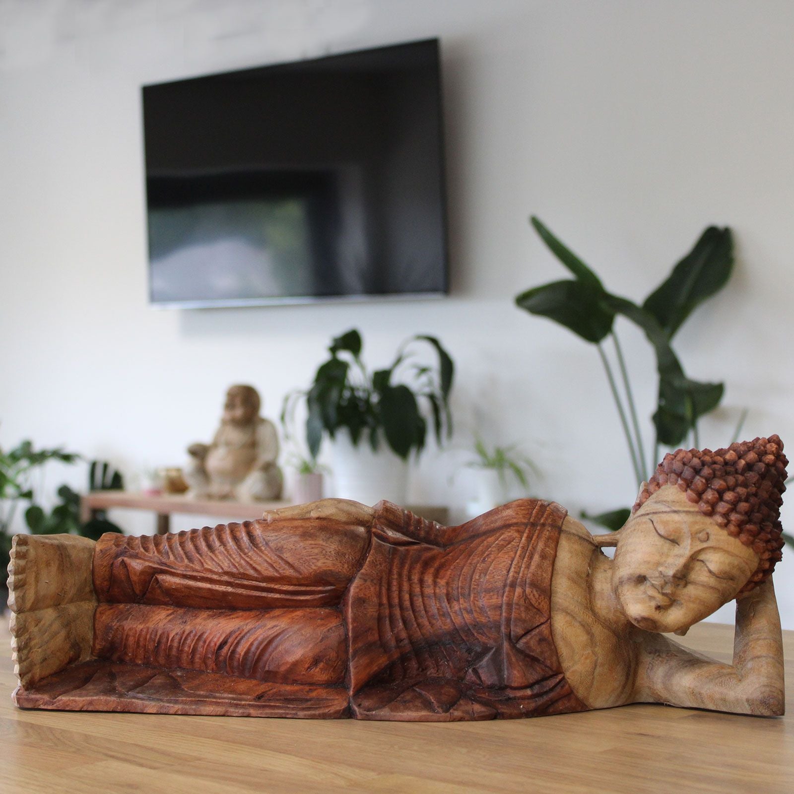 Large hand-carved Suar wood Sleeping Buddha statue with intricate three-dimensional details in a peaceful reclining pose.