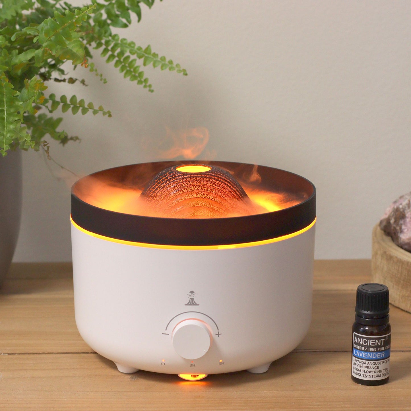 Large volcano effect aroma diffuser with a glowing mist eruption and a sleek black base.