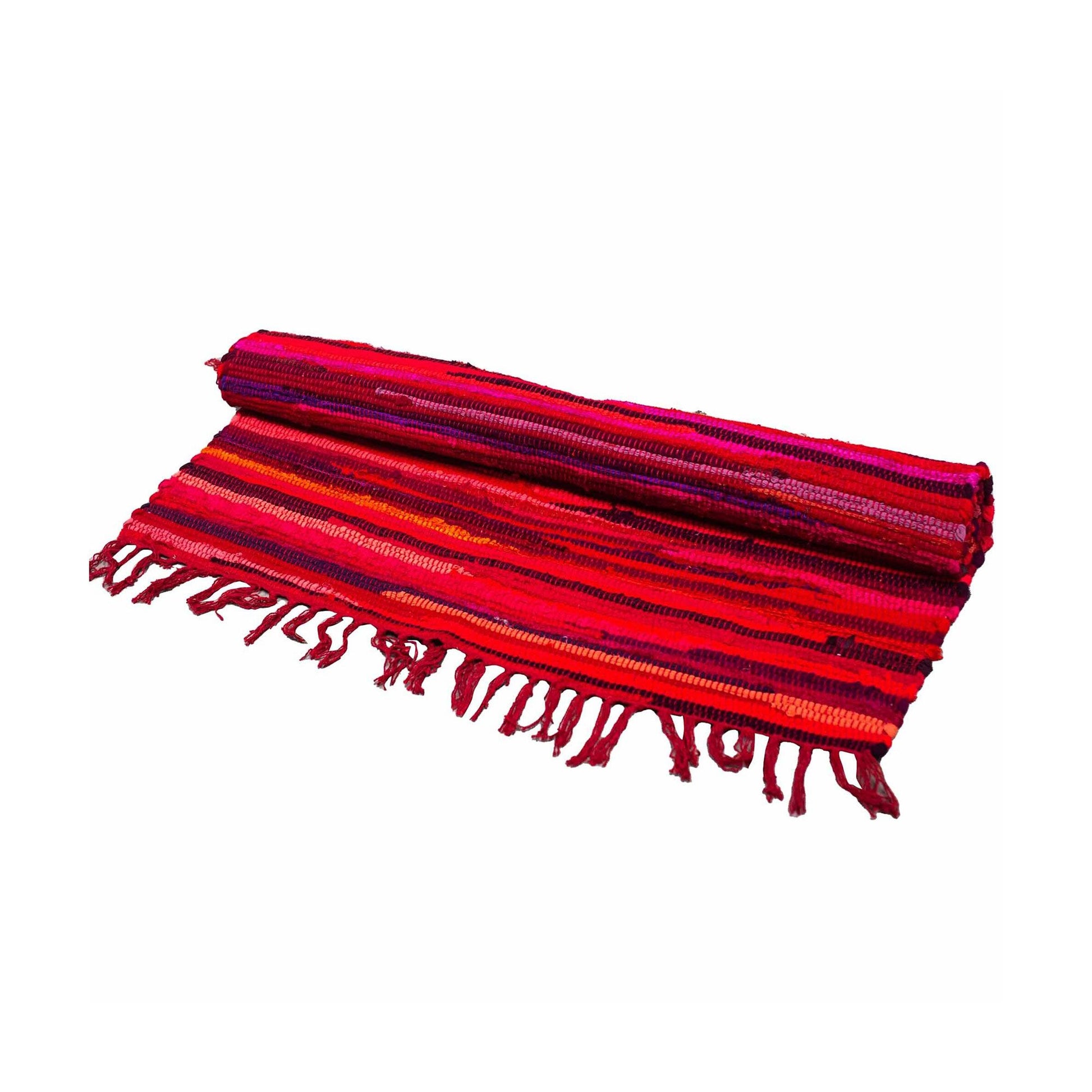 Handcrafted small rectangular rag rug featuring a vibrant weave of shocking pink and multicoloured cotton fabrics.